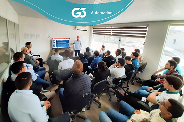 Equipe G3 Automation reunida para treinamento de investimento em ações.